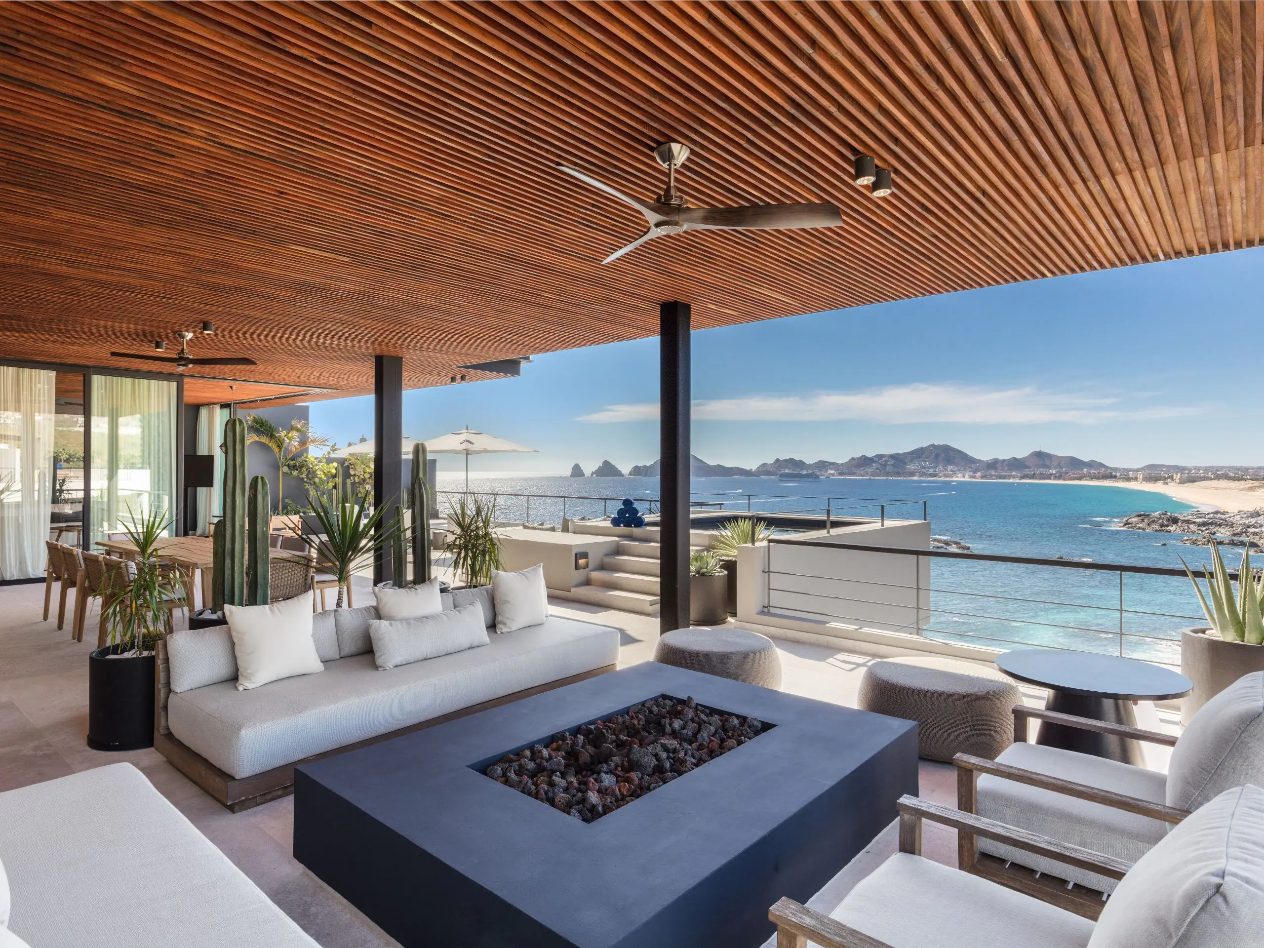 A terrace lounge at The Cape overlooking the bay and Land's End, Cabo San Lucas