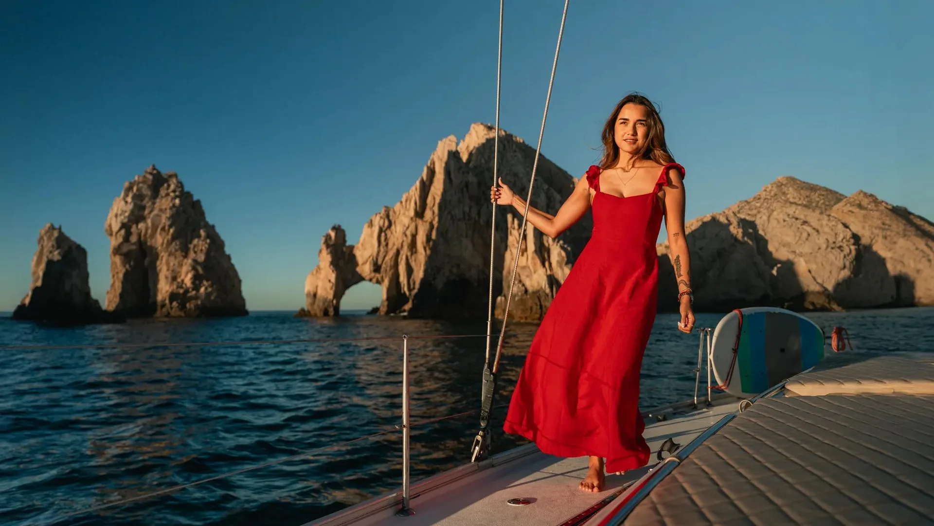 Rocky arch at Unveiling Paradise: A 2026 Diamante Cabo Golf Course Review from boat, with ocean