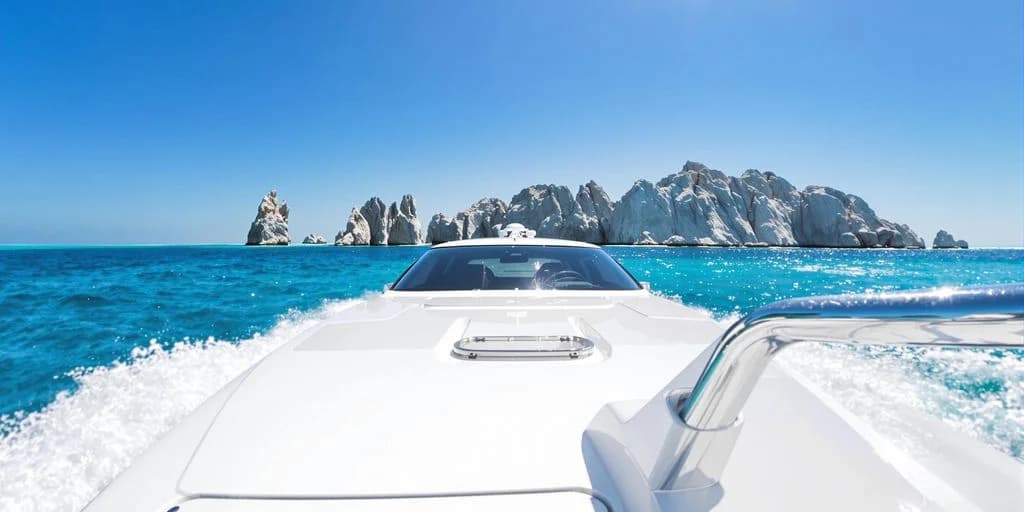 Yacht bow at Cabo Yacht Reviewed: What You Need to Know with rock formations beyond