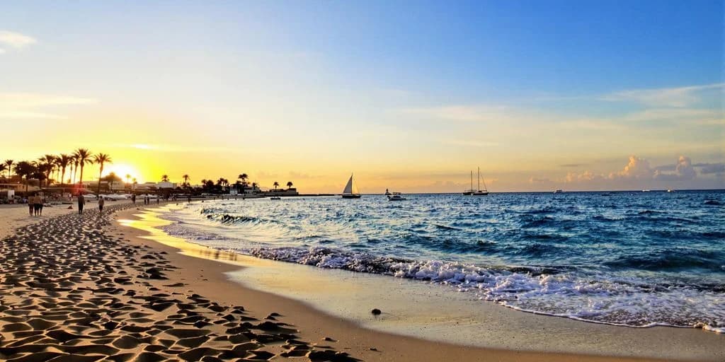 Beach sunset at San Jose Del Cabo Ranked: What You Need to Know with boats on horizon