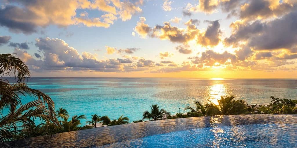 Infinity pool at Your guide to the best of all inclusive resorts baja cabo san lucas at sunset, with ocean beyond