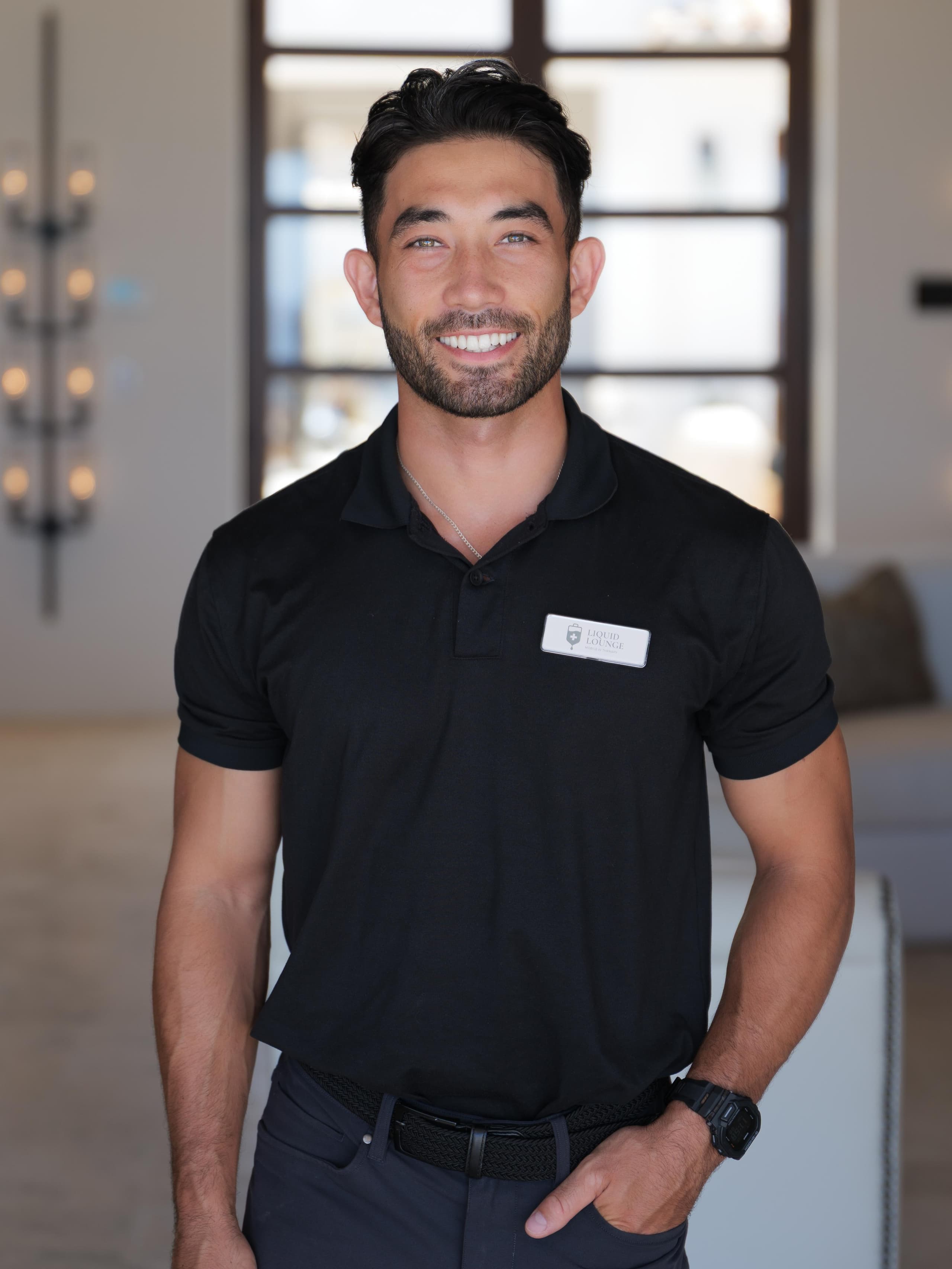 Man portrait at Your Ultimate Cabo San Lucas Beach Club Guide 2026 smiling, wearing necklace, close-up