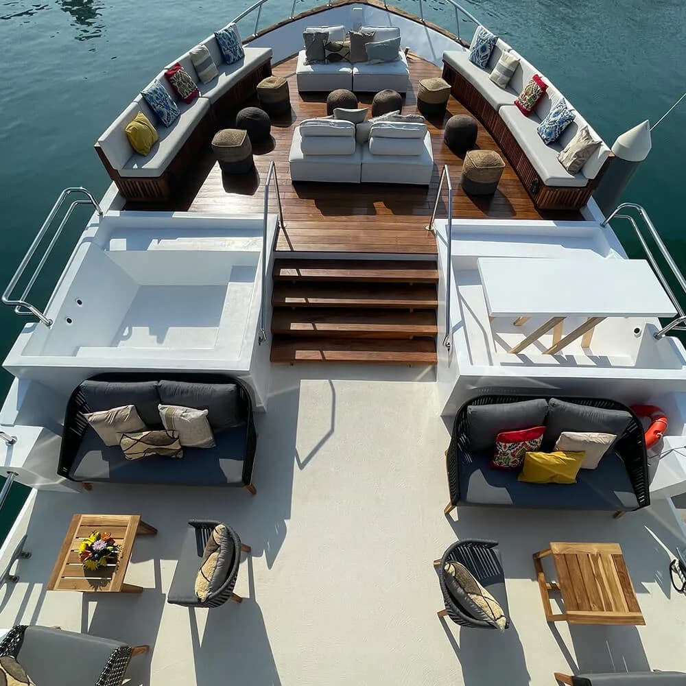 Yacht deck at Nanny & Childcare Service with lounge seating, stairs in Los Cabos