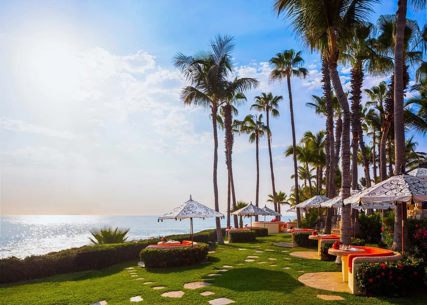 Resort lawn at Navigating Banking in Cabo: Why There's No Chase Bank Near Me (and What to Do Instead) with palm trees and