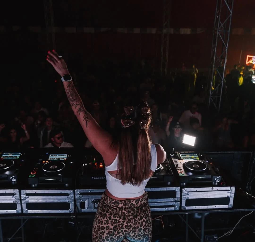 Dj performance 3 at Private DJ Experience woman from behind, leopard print in Los Cabos
