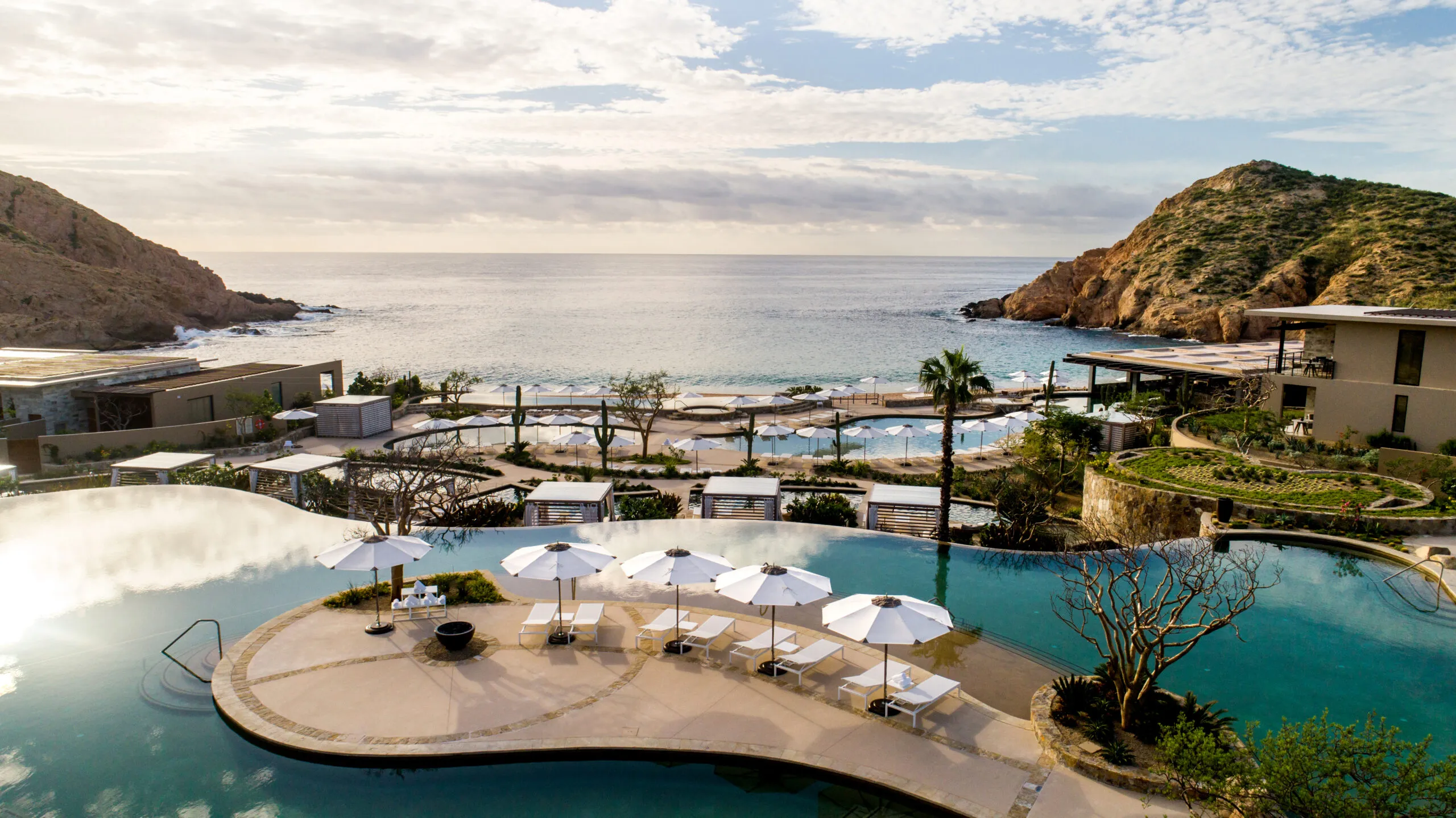 Resort pools and terraces above the ocean at Montage Los Cabos