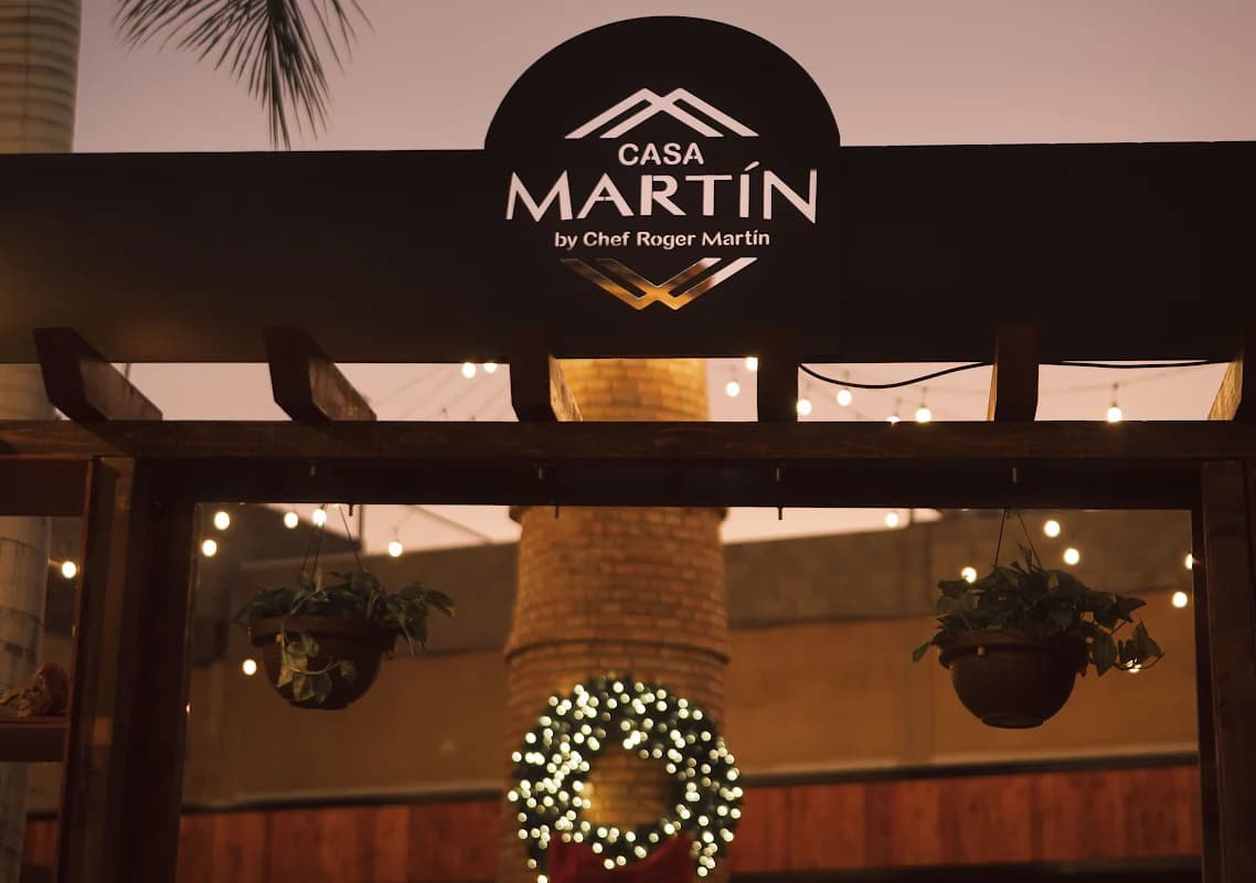 Restaurant signage at Casa Martin Restaurante San José with decorative wreath in San José del Cabo
