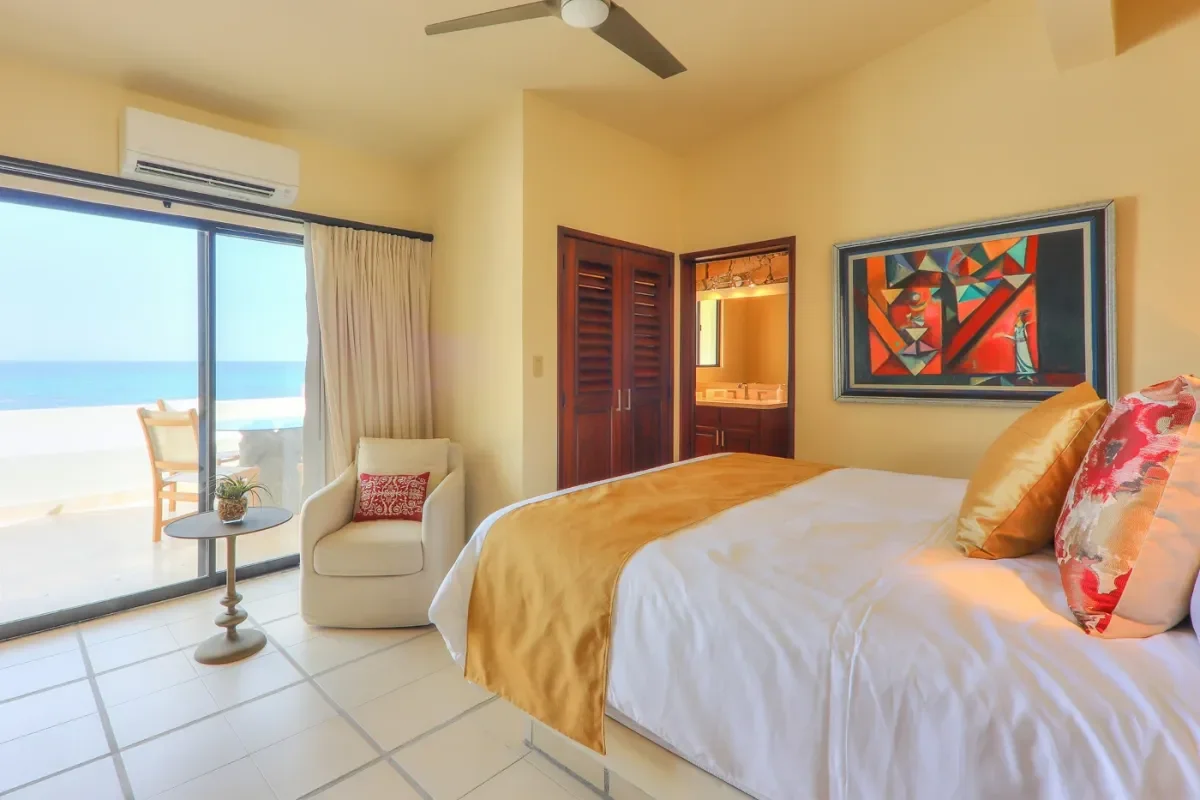 Bedroom 5 at Medano Beach Swimming with bathroom entrance, ceiling fan