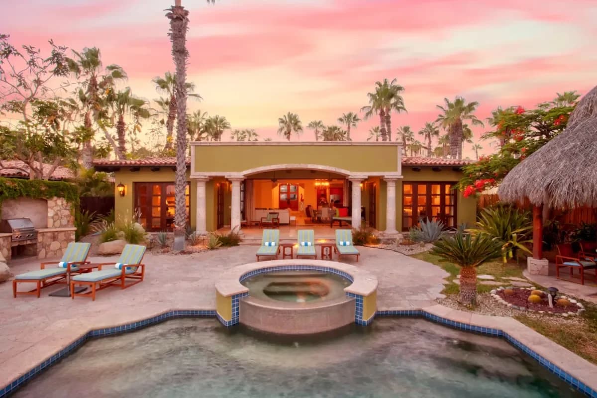 Exterior facade at Experience Serenity: Cabo San Lucas Sunrise Meditation Beach Guide 2026 at sunset, with open doors