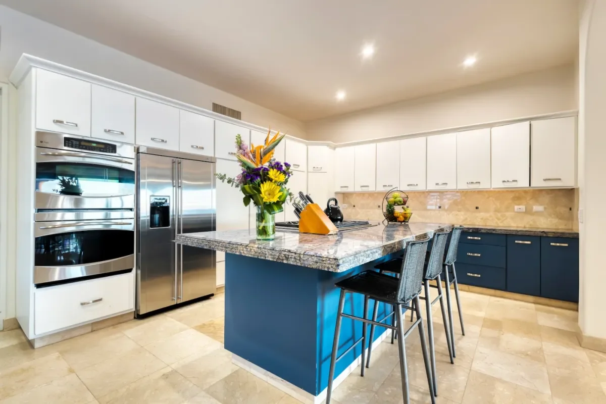 Kitchen island at Curated Cabo San Lucas Luxury Gift Guide for 2026 with flowers, blue base