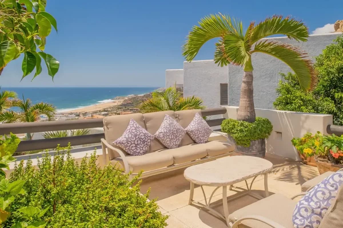 Outdoor lounge at Embrace Tranquility: Your 2026 Guide to Beach Yoga Classes in Cabo San Lucas with ocean view, sunny day