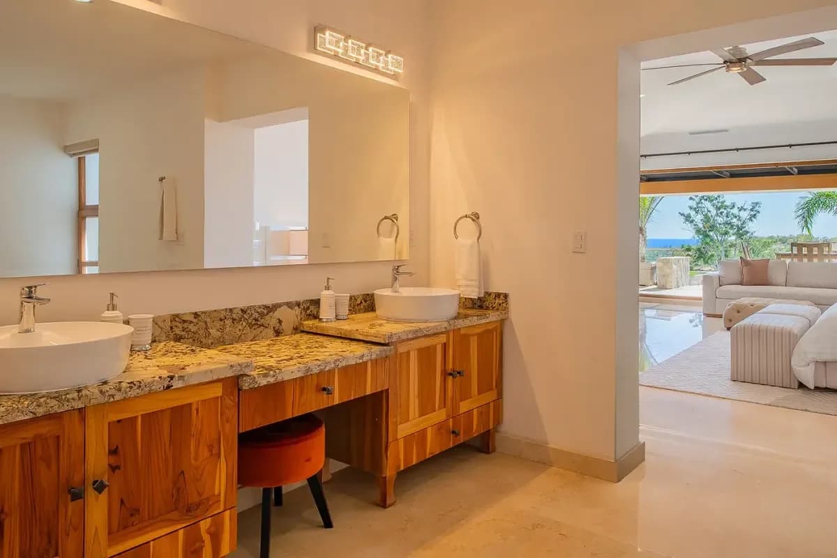 Bathroom vanity at Santa Maria Beach Photos with vessel sink, mirror