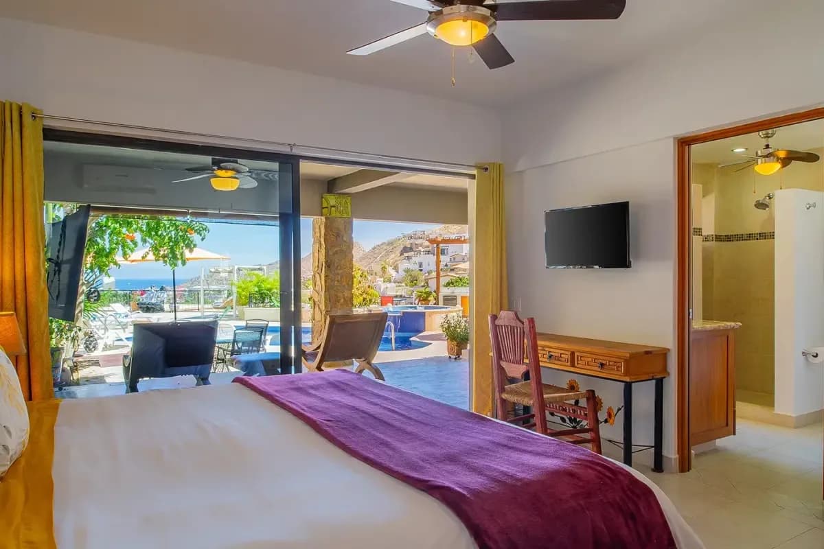 Bedroom 1 at Medano Beach Conditions with pool and mountain view