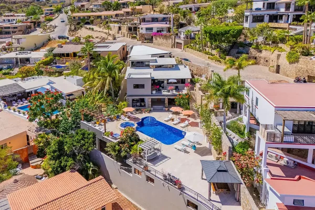 House exterior at Your Ultimate 2026 Guide to a Luxury Anniversary Trip in Cabo San Lucas aerial view with pool