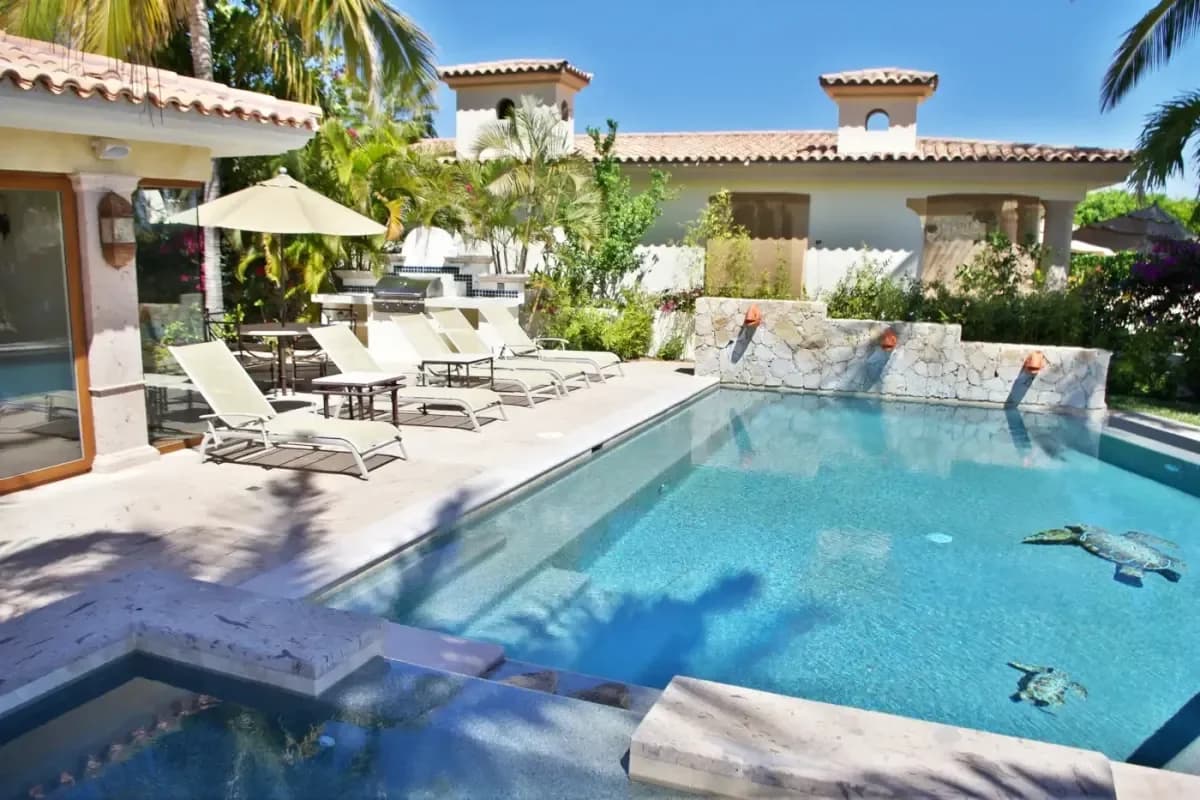 Swimming pool 3 at Finding Your Core: The Unapologetic Guide to Cabo San Lucas Pilates Studio Classes with lounge chairs