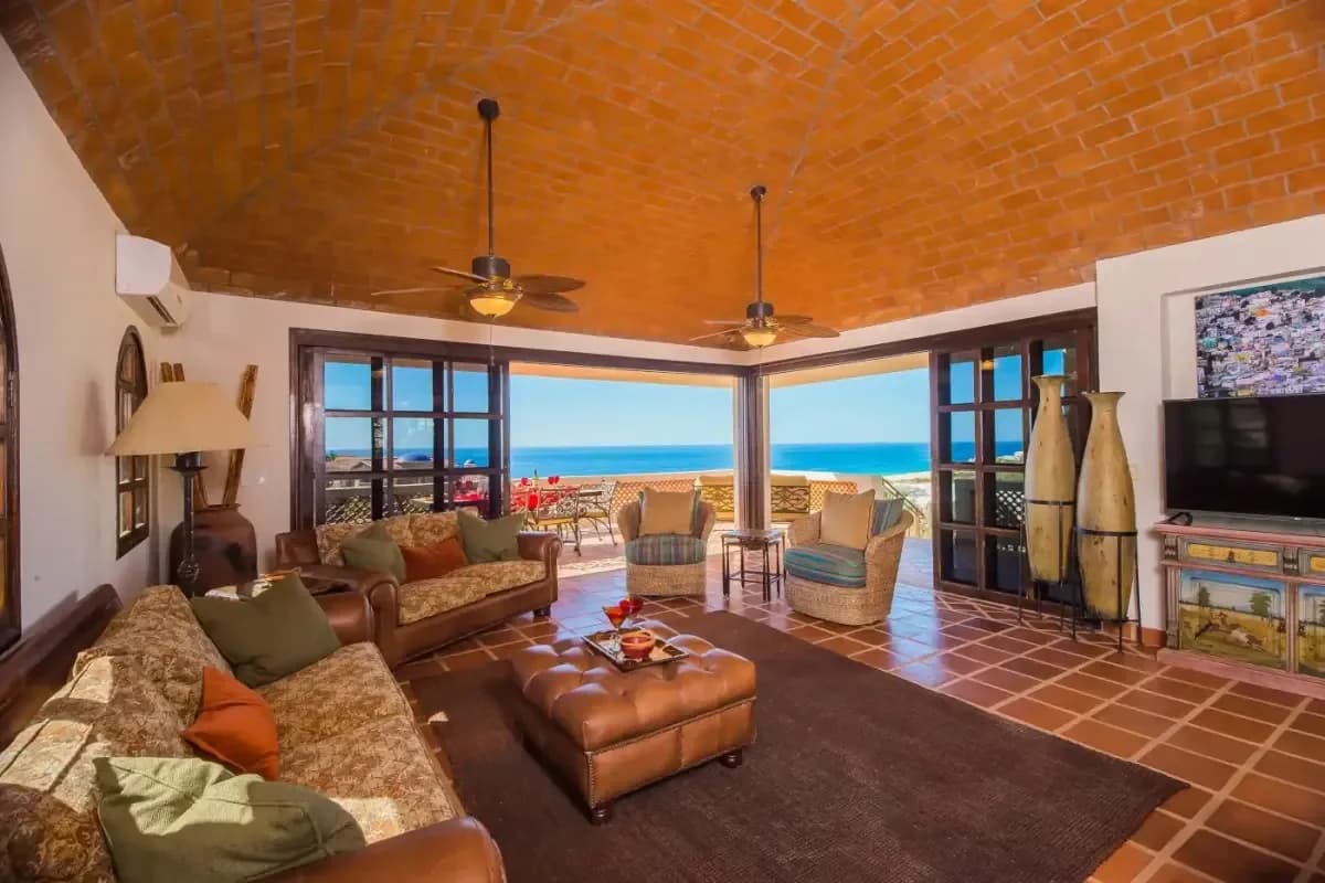Living room 1 at Discover Your Dream: An Ultra Luxury Villa Cabo with 10 Bedrooms in 2026 with ocean view, open doors