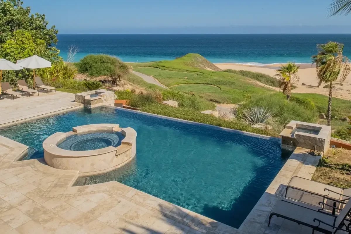 Infinity pool 1 at Villa Cortez with ocean and golf course in Cabo Del Sol