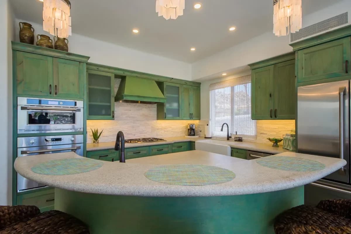 Kitchen detail at Crafting Your Dream Cabo San Lucas Wedding Weekend Itinerary 2026 with green cabinets, island countertop