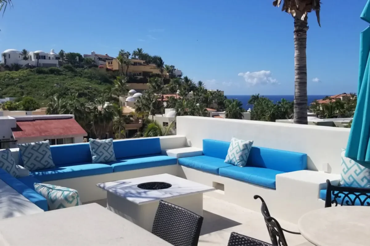 Rooftop terrace 1 at Retirement in Cabo During Peak Winter Season with ocean view, blue cushions