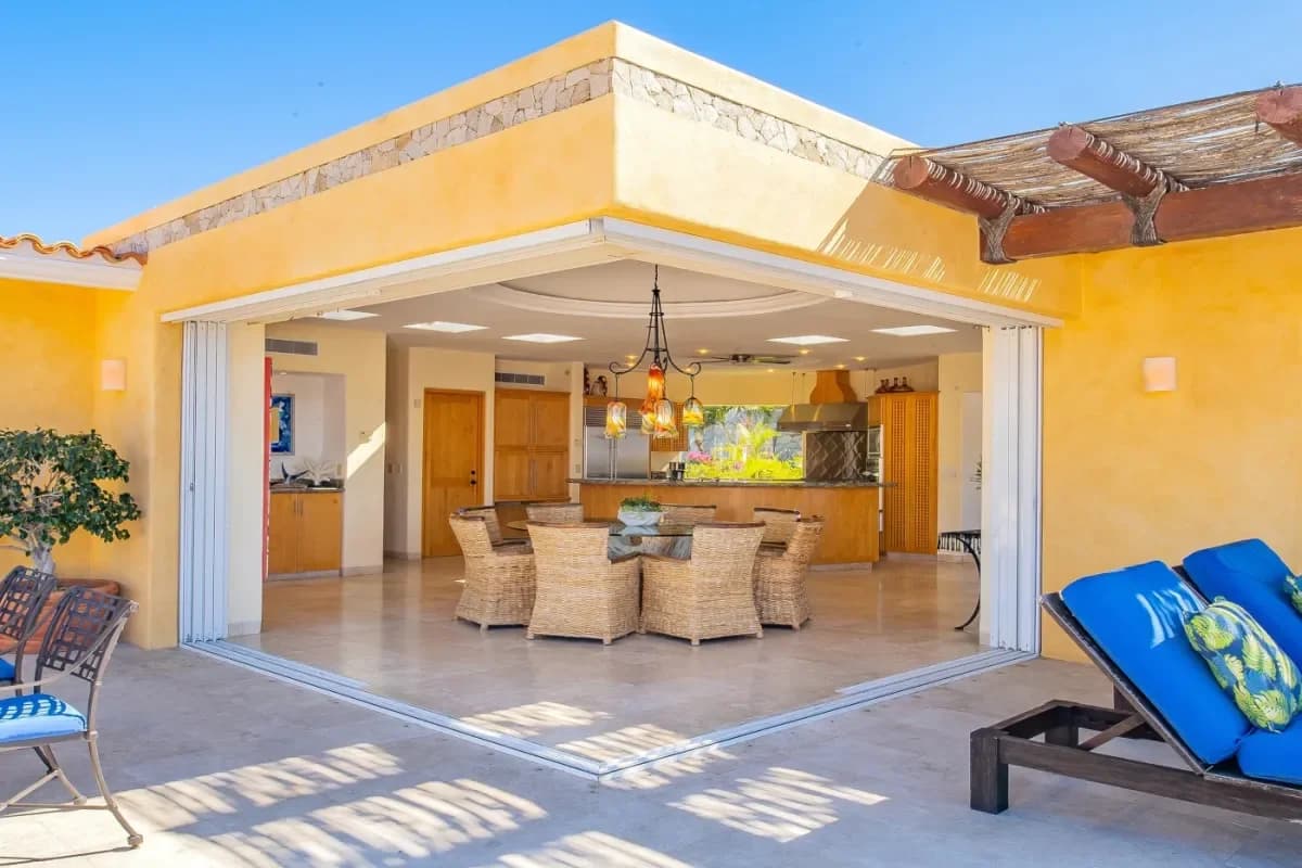 Outdoor dining area at Stay Fit in Paradise: Your 2026 Guide to a Villa with Gym in Cabo San Lucas with open kitchen, in