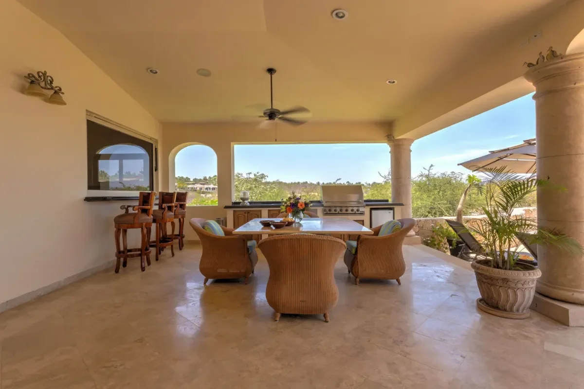 Outdoor dining area 2 at Villa Esquina with grill and distant view in Cabo Del Sol