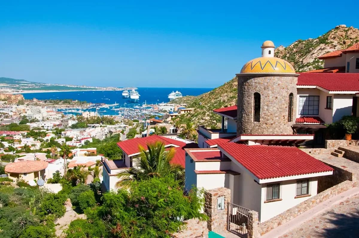 Hillside villas at Villa Golden Dome with ocean and cruise ships in Pedregal Bay