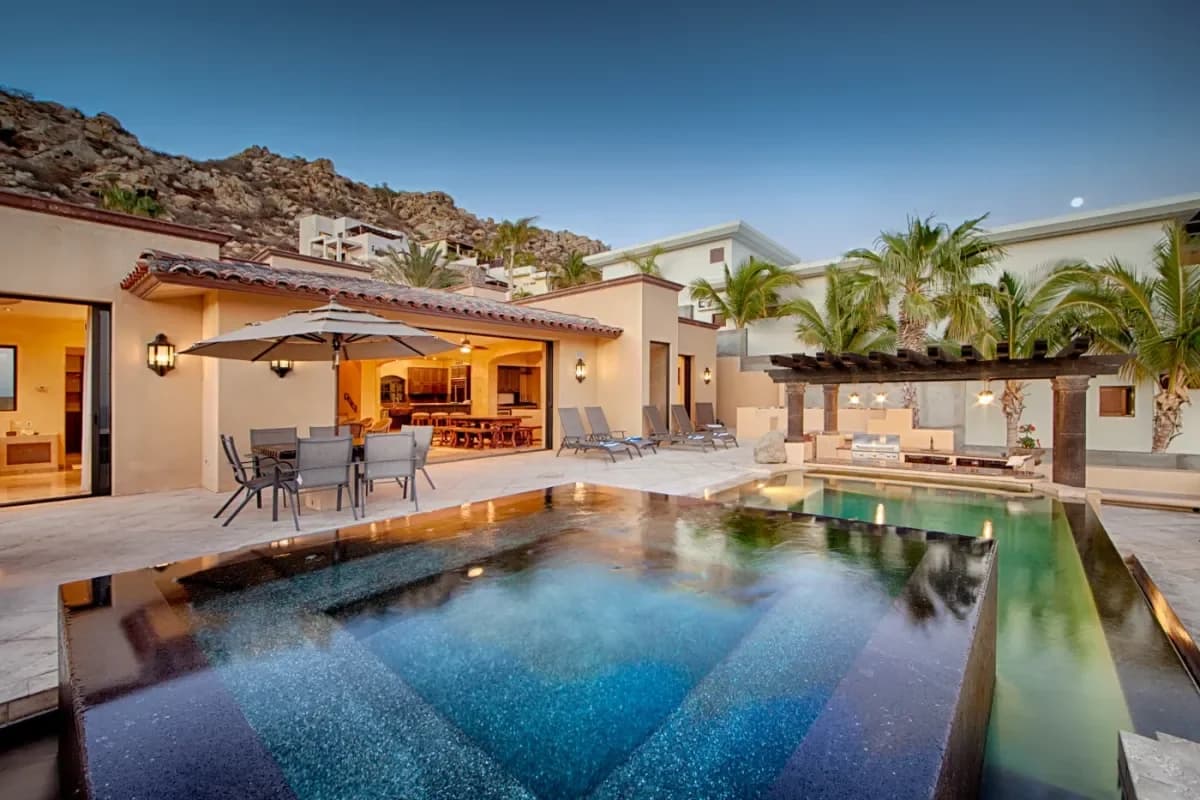 Infinity pool at The Unvarnished Truth: A Luxury Spa Day Cabo San Lucas Guide for the Discerning Traveler at dusk, with
