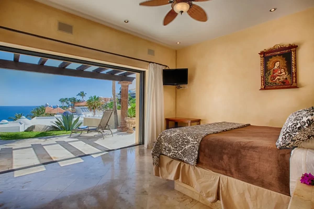 Primary bedroom 6 at Can You Swim At Costa Azul Beach with patio and ceiling-fan