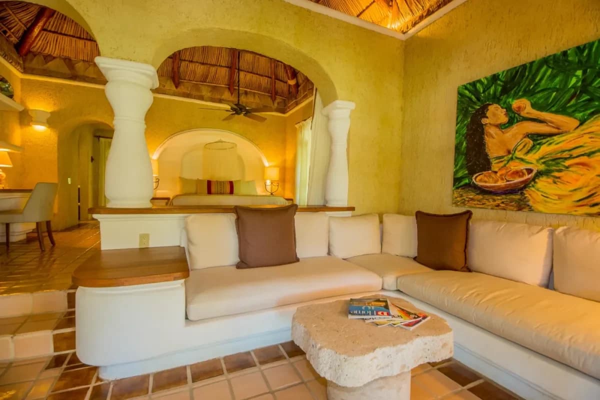 Living room at Experience Unrivaled Views: Luxury Cliff Side Villas in Cabo 2026 with sofa, stone coffee table