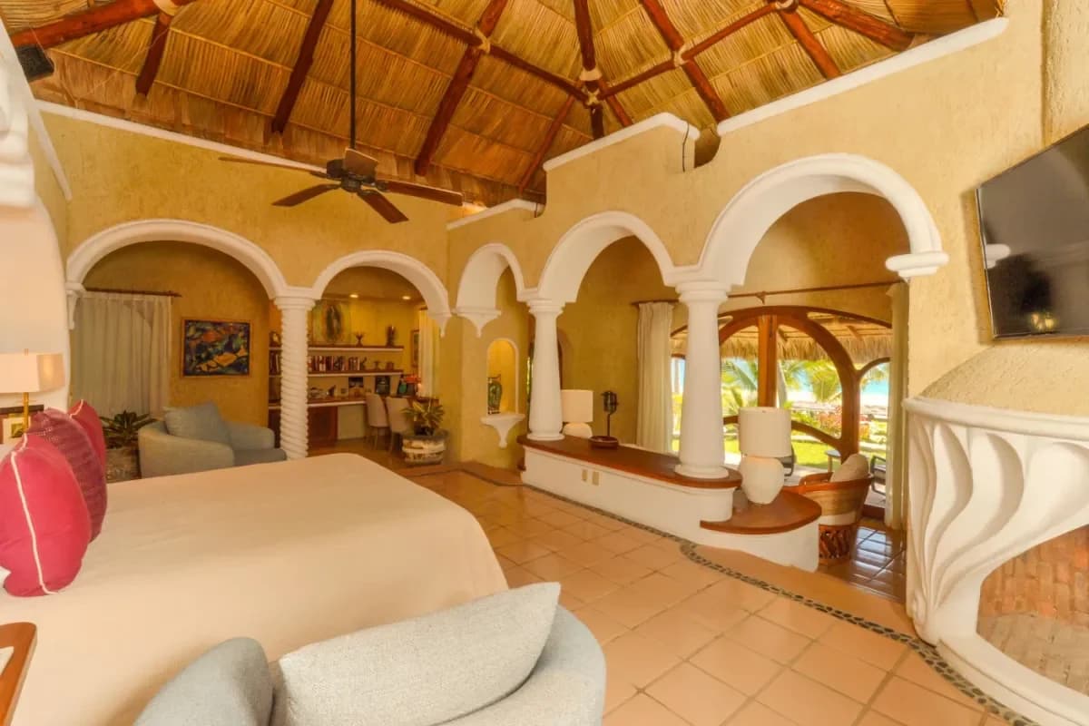 Primary bedroom 1 at Beyond the Brochure: Crafting Ultra Luxury Cabo $50K+ Experiences view with arches, tiled floor