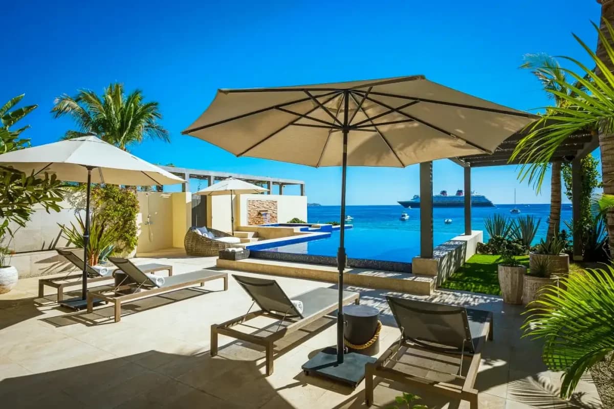 Infinity pool at Your 2026 Guide to the Best Villas Near Medano Beach, Cabo San Lucas with ocean beyond, day