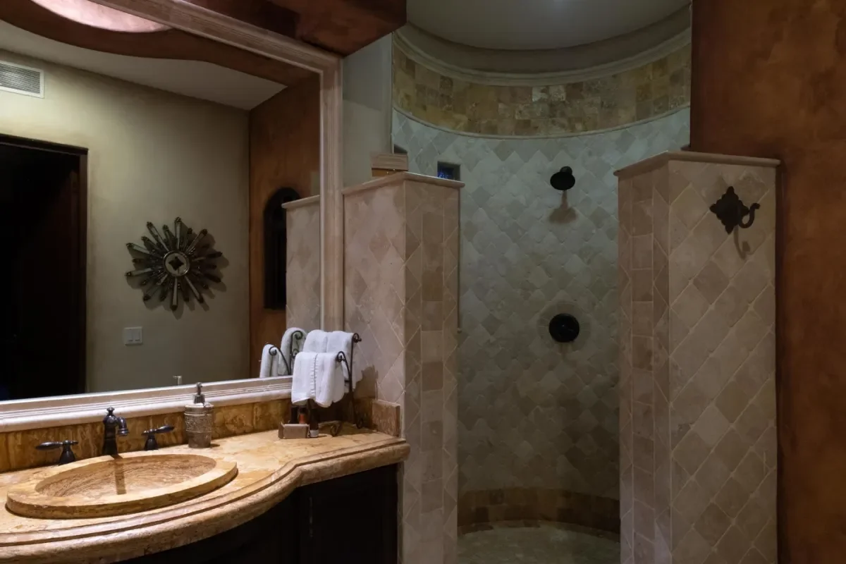 Bathroom 1 at Cabo Christmas Tree Lighting 2026: Dates & Locations shower area, vanity, towels