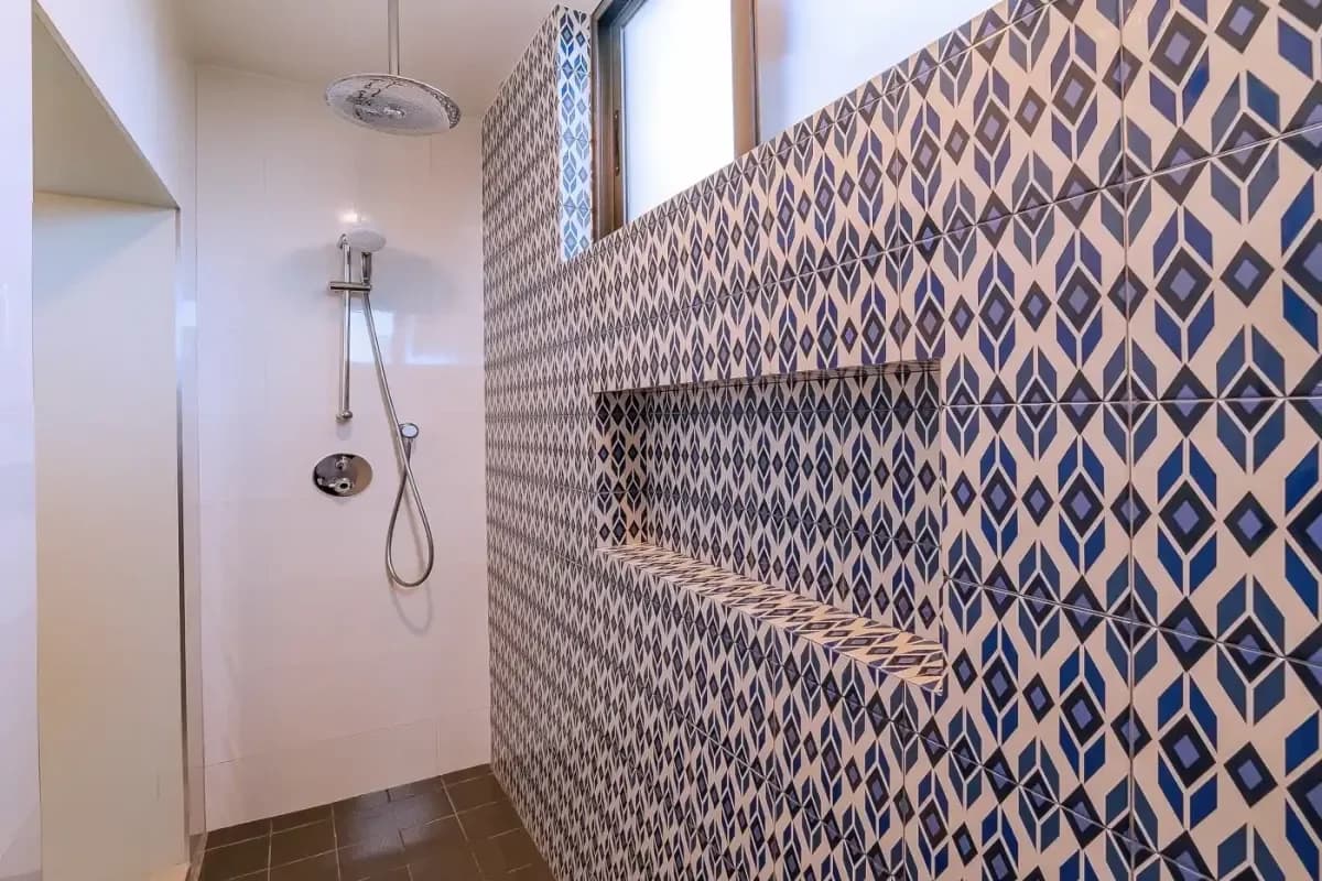 Shower stall at Cabo Wedding Cost for 50 Guests: Real Price Breakdown with patterned tiles, window