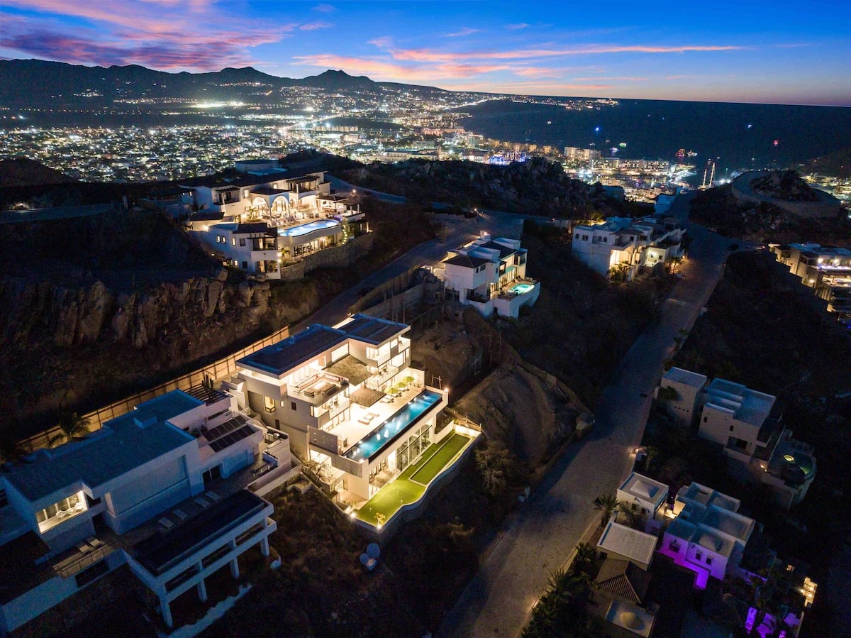 Luxury homes at Villa Savina aerial view, at night in Pedregal Pacific