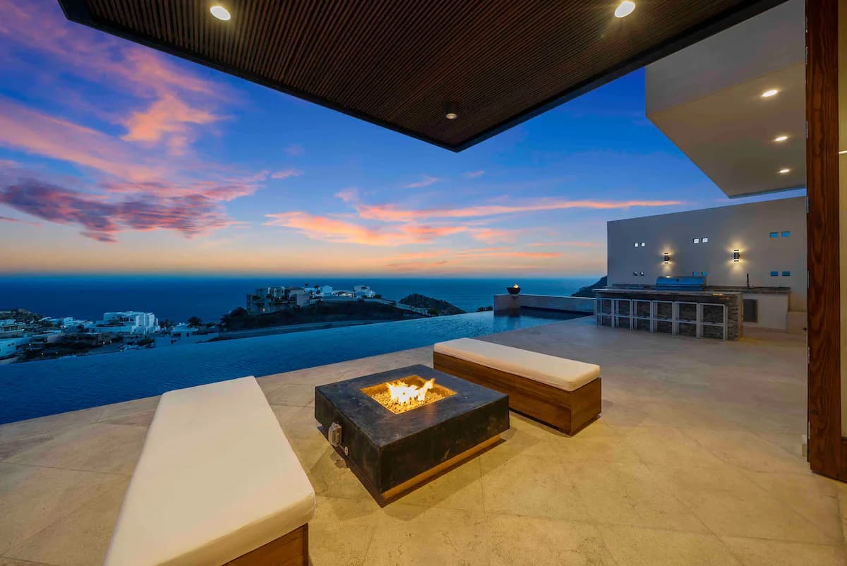 Outdoor fire pit at Elevate Your Family Vacation: Cabo San Lucas Luxury Babysitting & Nanny Services for 2026 with infinity