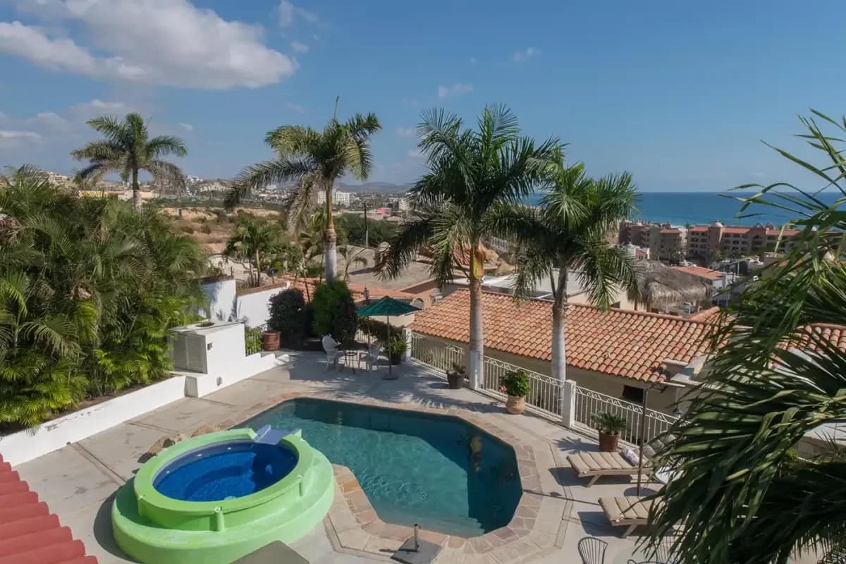 Pool with view 2 at Plane tickets to Cabo: Your price guide in 2026 with distant city and ocean
