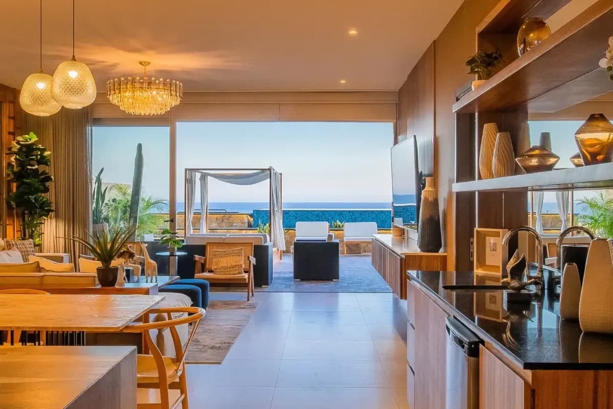 Outdoor terrace at Divorce Beach Worth It with ocean view, daybeds