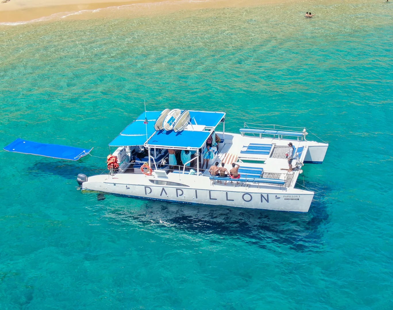 Catamaran boat 2 on the Catamaran 47ft with sandy beach, aerial view in Cabo San Lucas