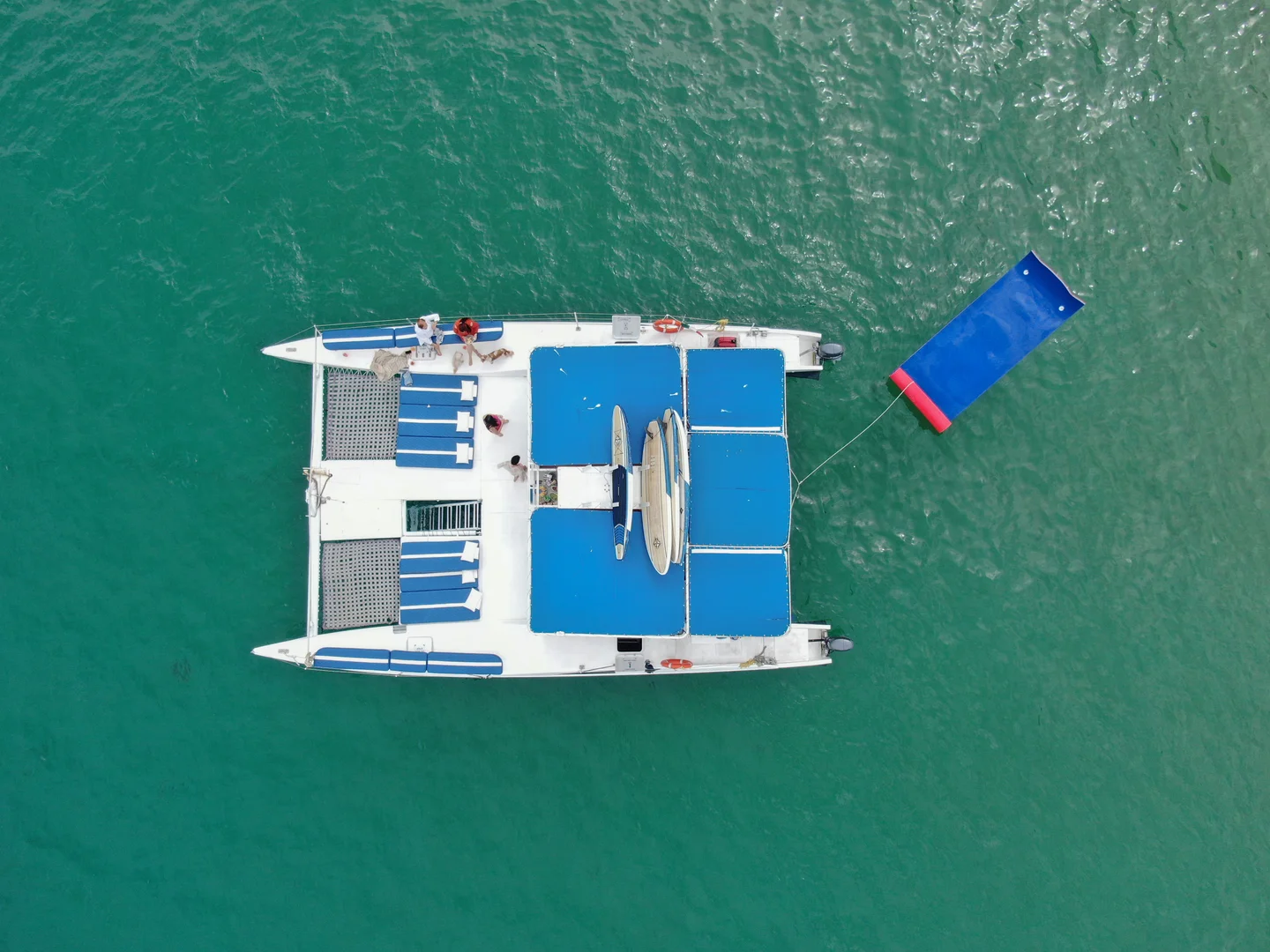 Catamaran boat 3 on the Catamaran 47ft direct aerial view, on water in Cabo San Lucas