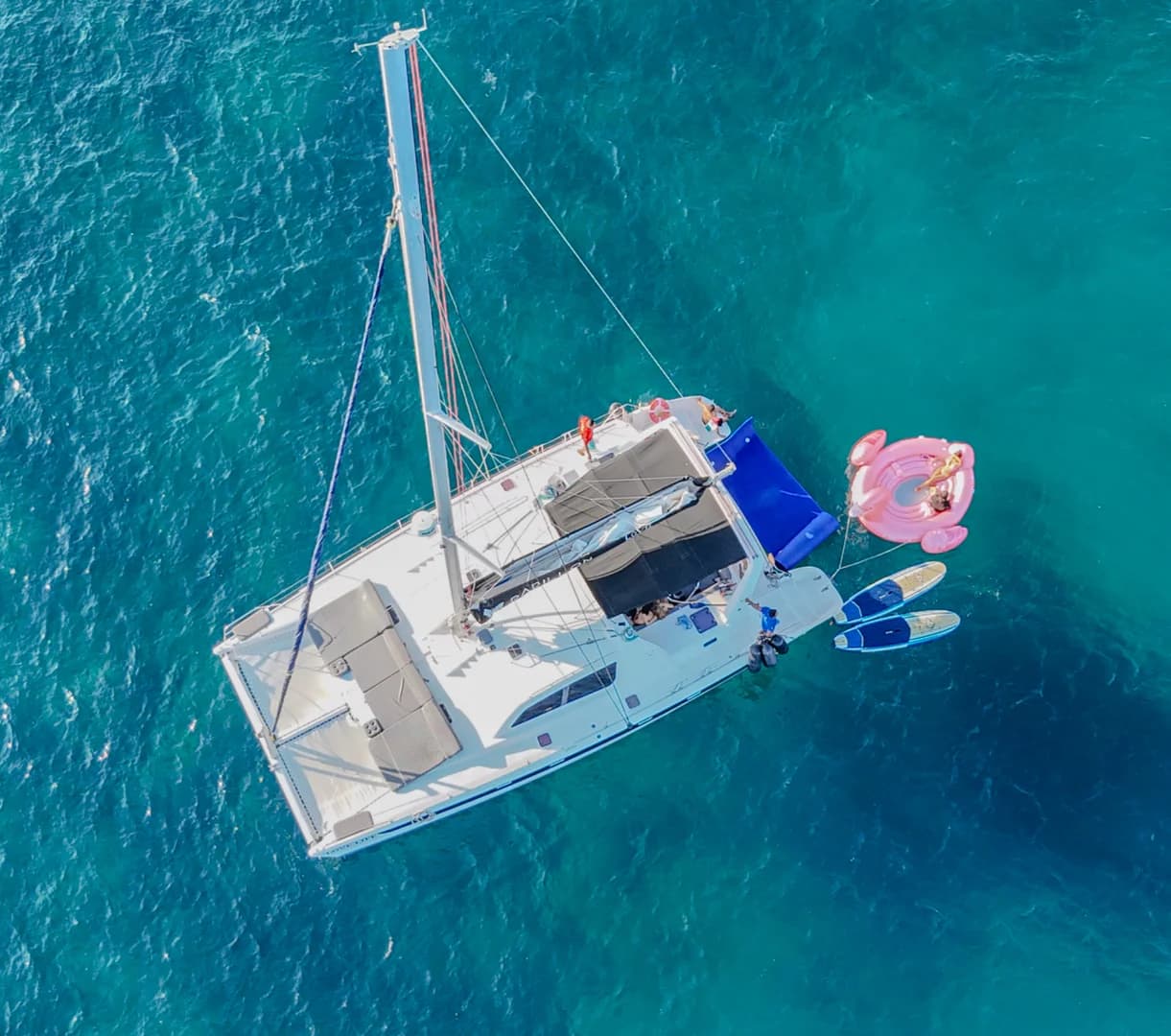 Catamaran aerial at Experience Unrivaled Luxury: Your 2026 Mega Yacht Charter Cabo Guide from above, on blue water