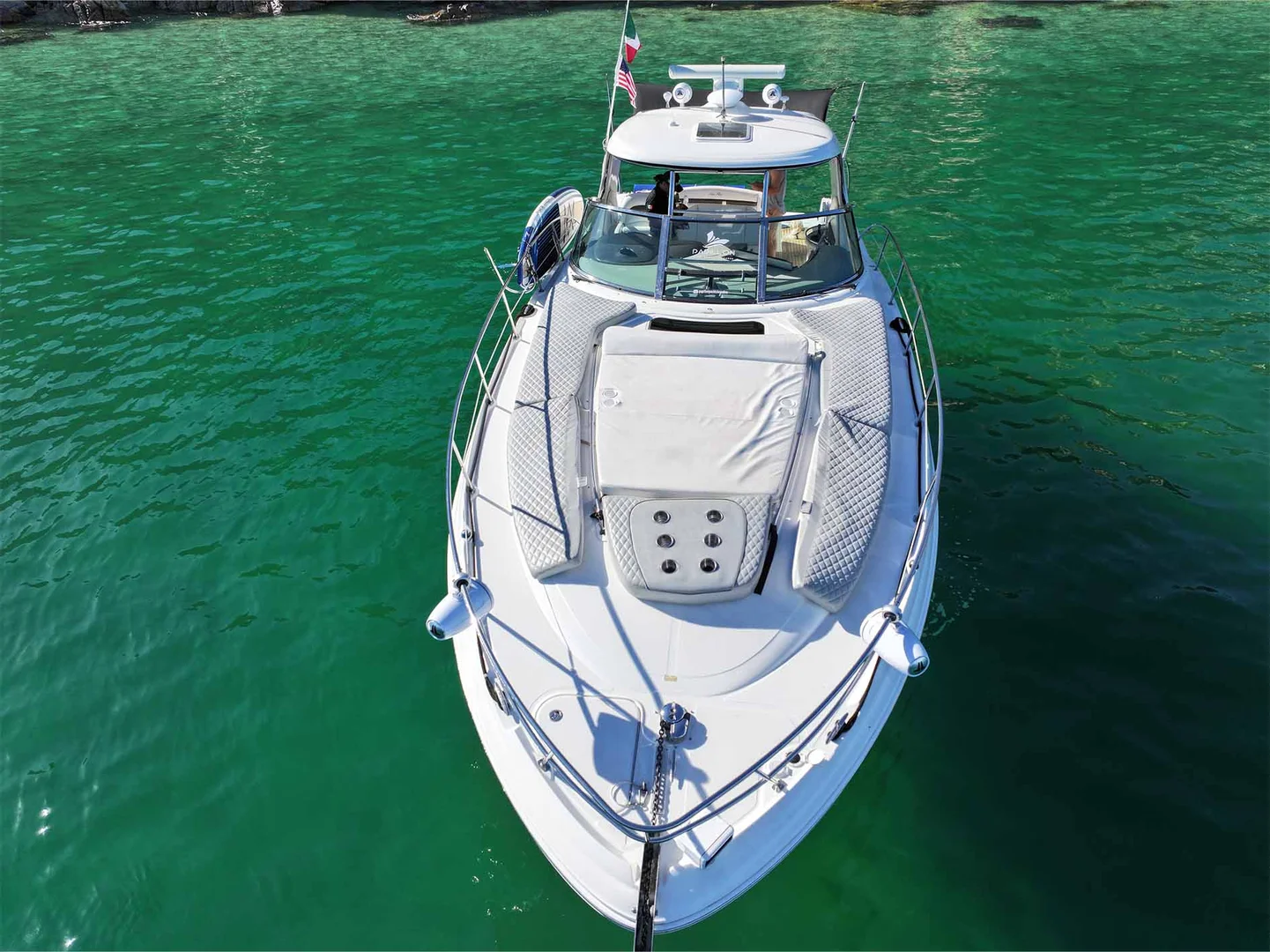 Yacht bow 2 on the SeaRay Sundancer 45ft from above, on water in Cabo San Lucas