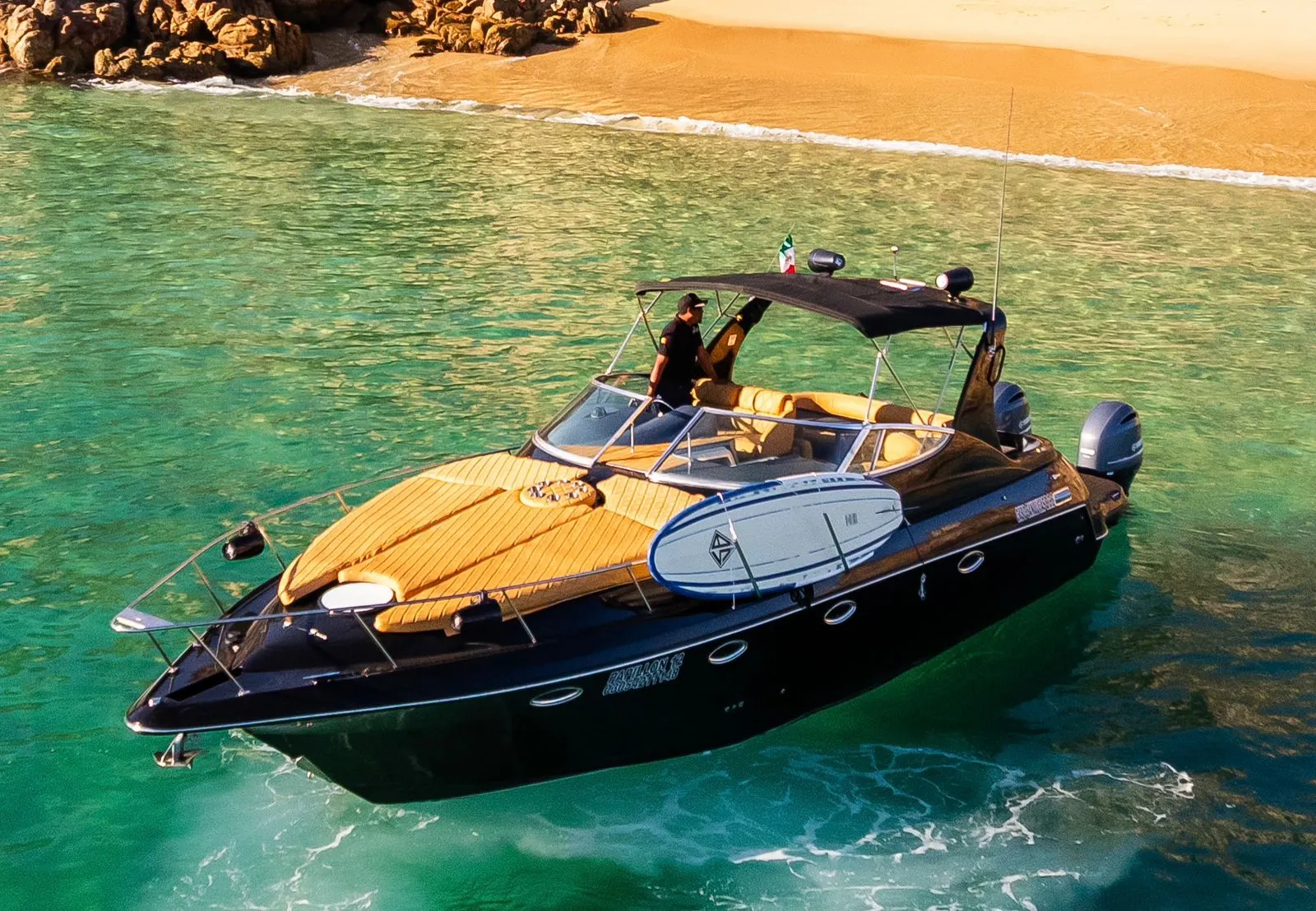 Yacht Cruiser 37ft, with person, sandy beach, in Cabo San Lucas