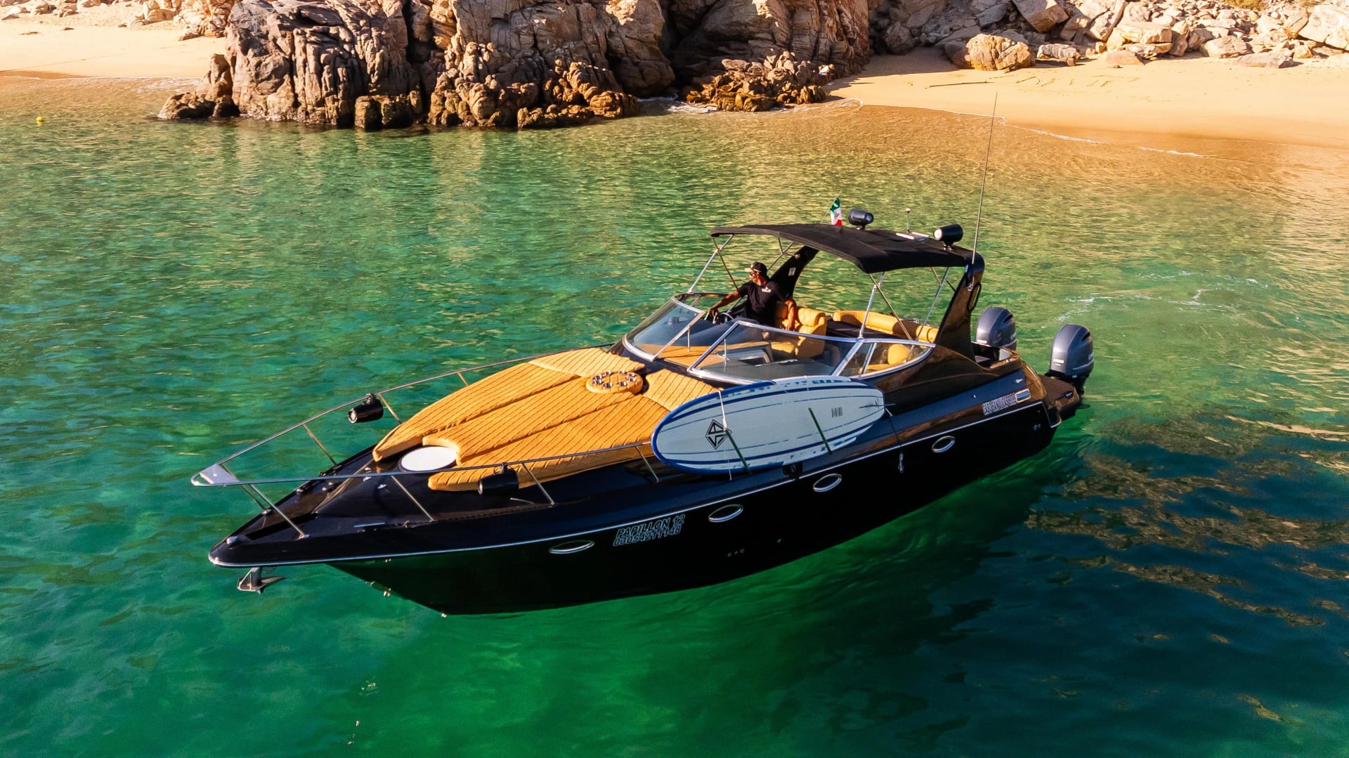 Yacht Cruiser 37ft, with paddleboard, clear water, in Cabo San Lucas